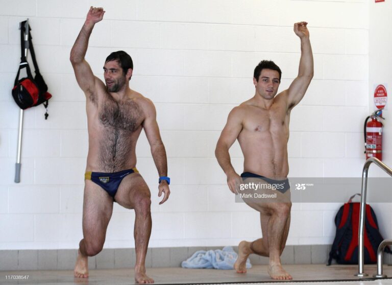 How about: “Speedo Heatwave: Hot, Dripping Men Ignite Summer’s Blazing Arena