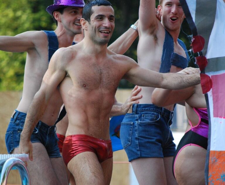 Wet & Wild: Speedos Sizzle on Sun-Kissed Studs!