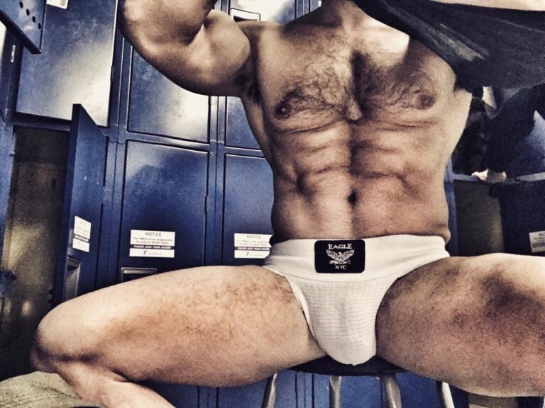 Slick Skin & Soaked Speedos: Dive Into Desire!