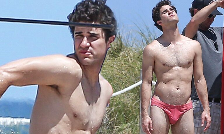 Speedo Seductions: Beach Heat, Muscle Meet” (51 characters)

Alternatives:
1. “Beachside Briefs: Tanned Bodies, Tight Fits” (48 characters)
2. “Sandy Speedos: Wet, Wild, & Wickedly Close” (47 characters)
3. “Sun, Sweat, & Speedos: Seaside Sic Retreats” (4