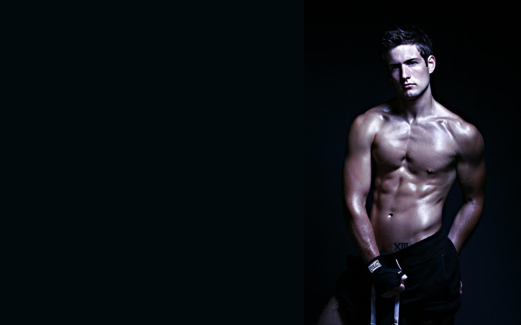 Beneath a Sour Moon, I Kneel to Kiss Logan’s Sweet Flesh